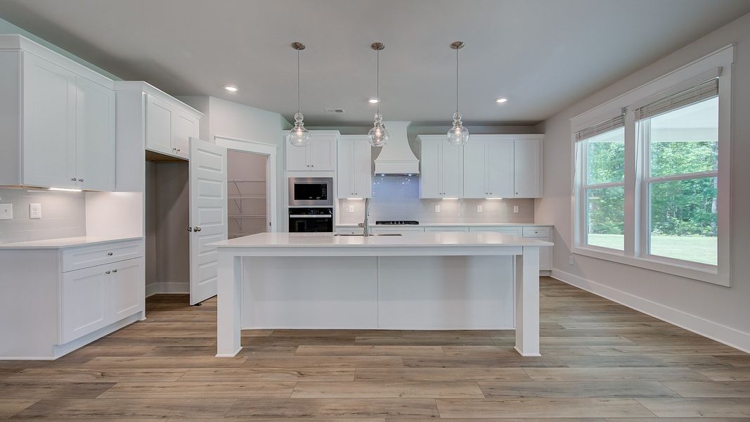 Representative furnished interior of a home built from the Margaret by DRB Homes in Saddleridge, Senoia (Image 14).