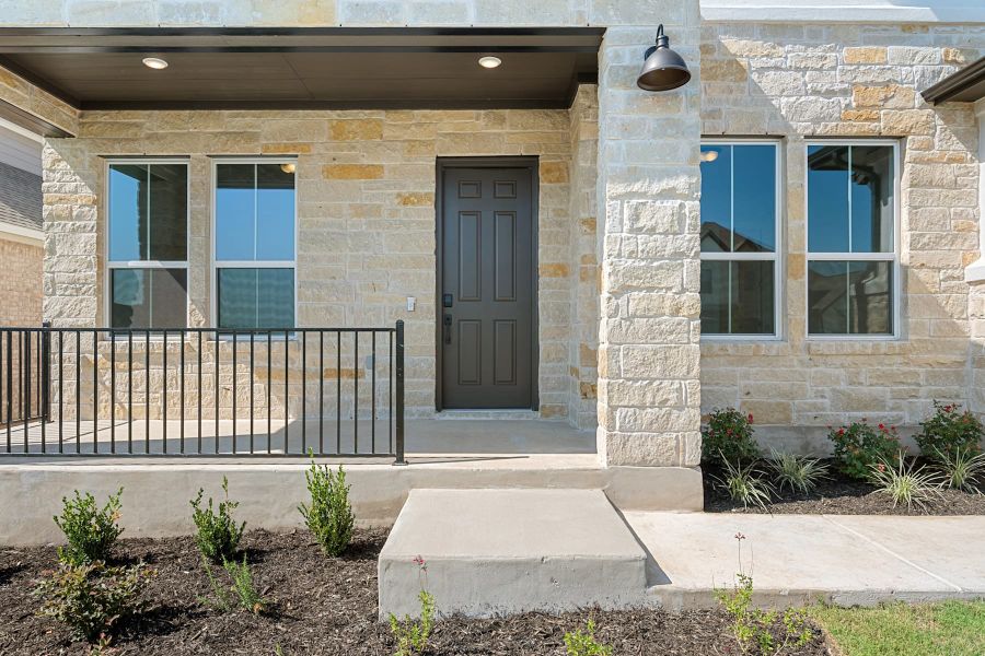 Exterior details and patio area of a home in Lariat, Liberty Hill (Image 3).