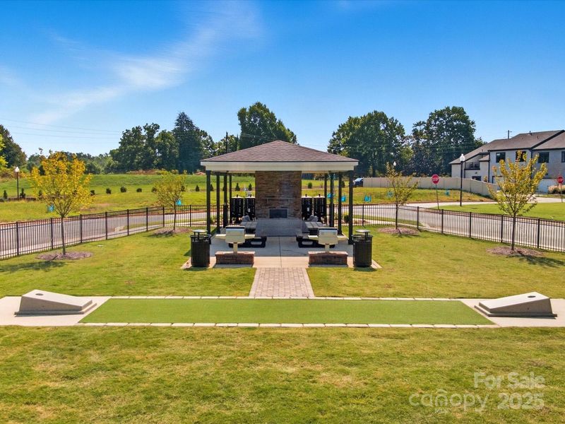 Community Amenity Including Grills, a Lounge, and Bags Game.