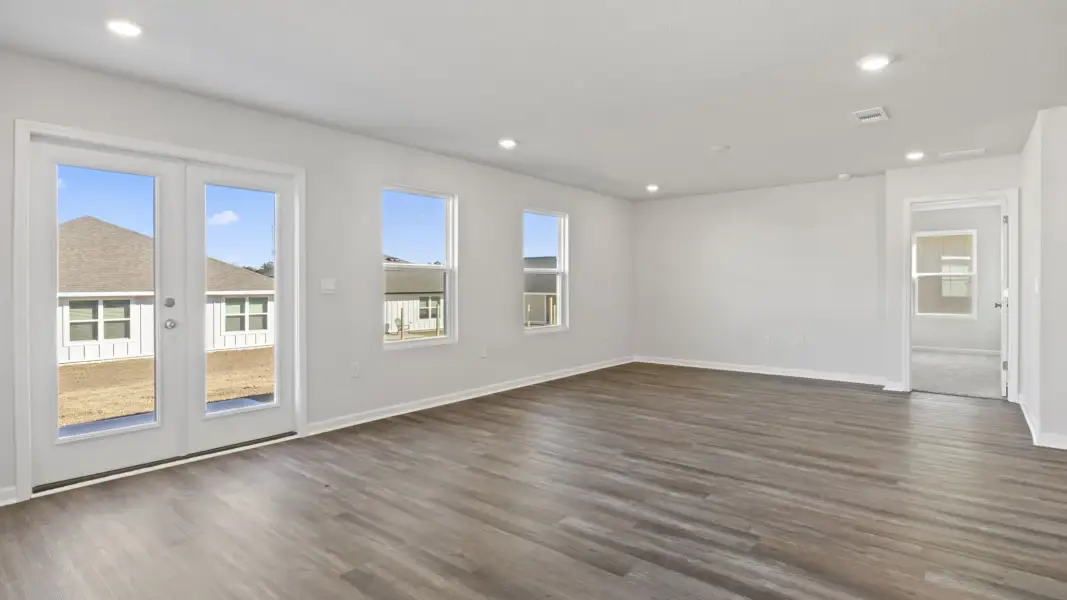 Spacious, unfurnished interior of a new home in Magnolia at the Bluffs Phase 3, Freeport (Image 11).