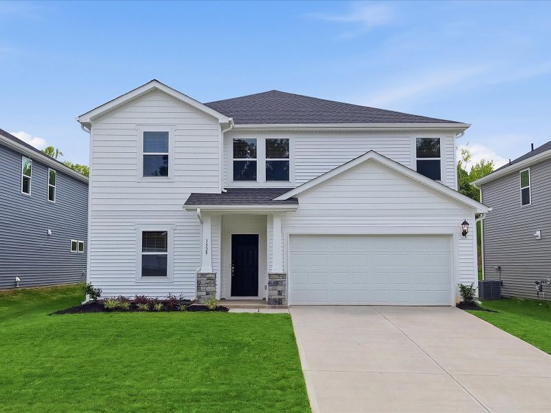 Front exterior of a new home in Collier Ridge, Moore, SC, highlighting curb appeal (Image 1). Front exterior of a new home in Collier Ridge, Moore, SC, highlighting curb appeal (Image 1).