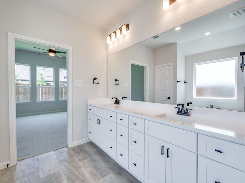 No shortage of space or style in this gorgeous owner's bath!