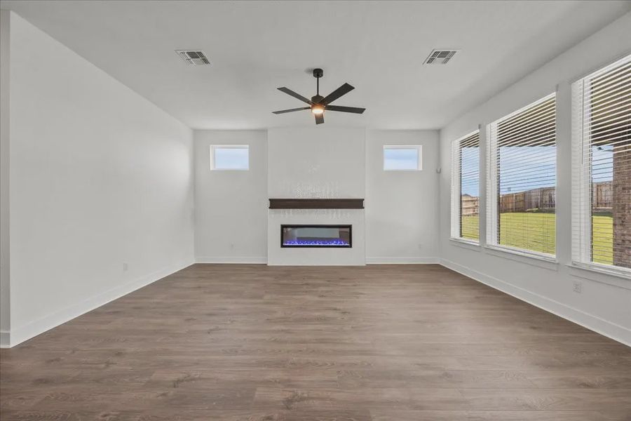 Representative unfurnished interior of a home built from the Courtney by Chesmar Homes in 6 Creeks, Kyle (Image 10).