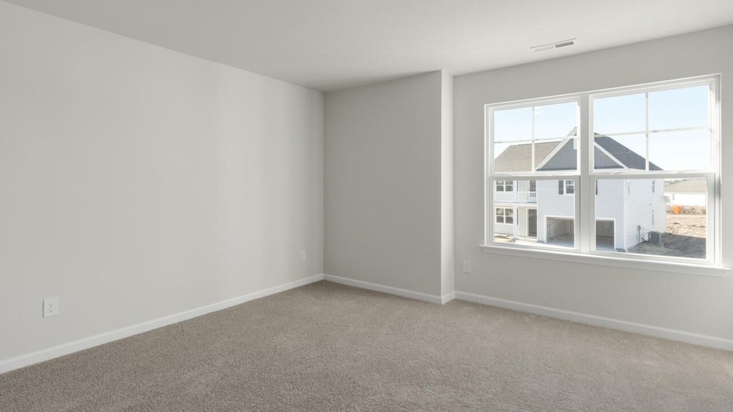 Representative unfurnished interior of a home built from the HARBOR OAK by D.R. Horton in Indigo Preserve, Leland (Image 43).