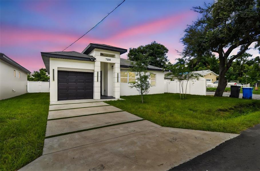 Front exterior of a new home in , Tampa, FL, highlighting curb appeal (Image 40).