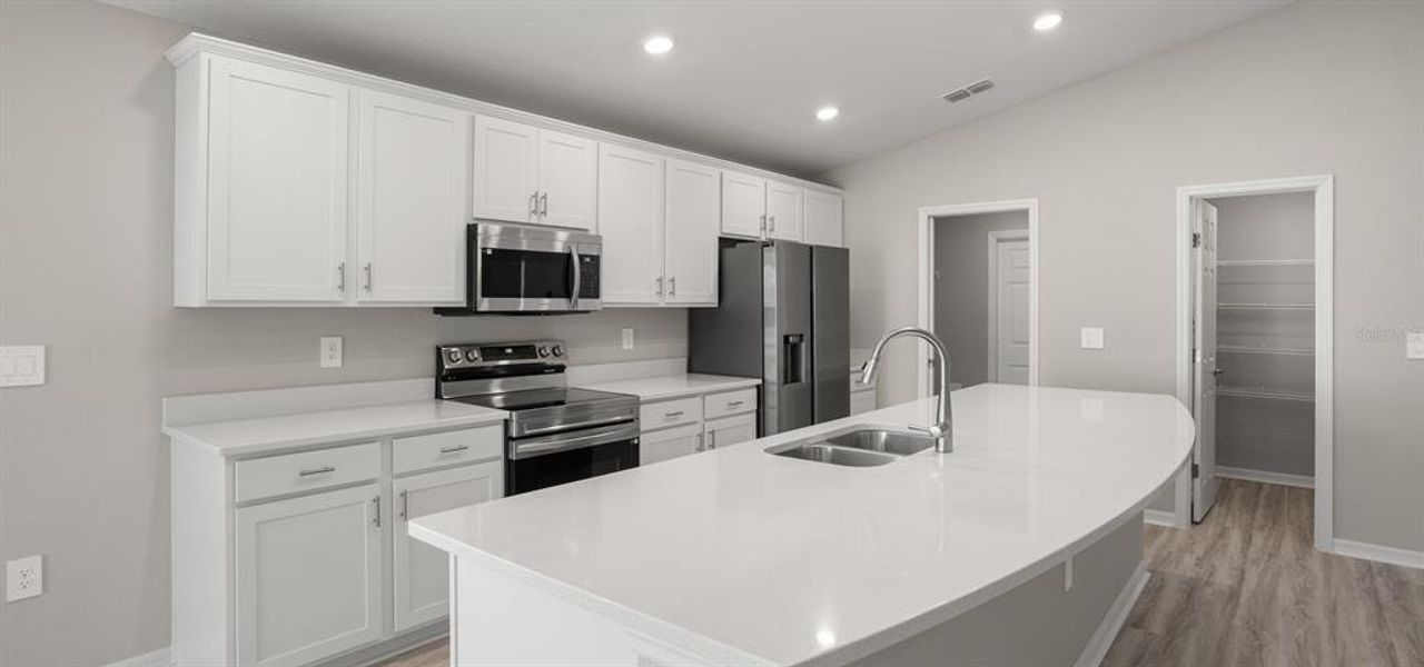 Furnished interior view inside a new home in VillaMar, Winter Haven (Image 6).