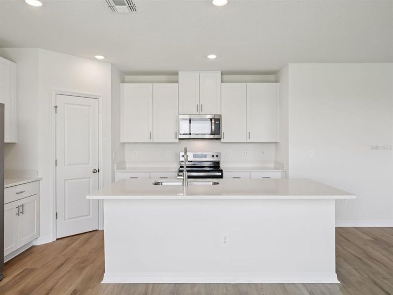 Furnished interior view inside a new home in Oakfield Trails - Premier Series, Parrish (Image 14).