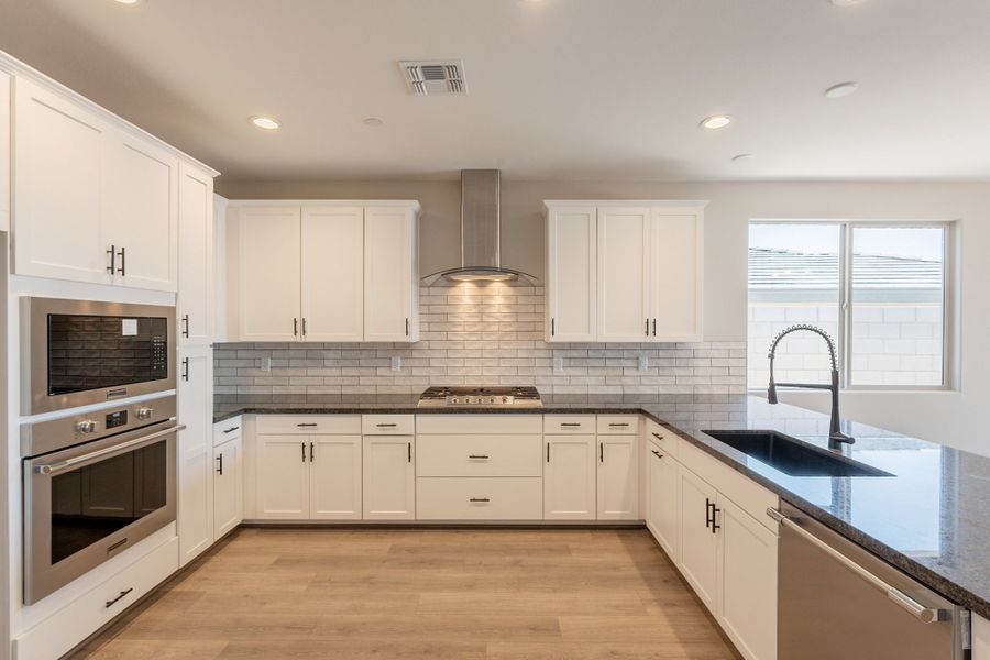 Representative furnished interior of a home built from the Larkspur by DRB Homes in The Villas at Mystic, Peoria (Image 7).