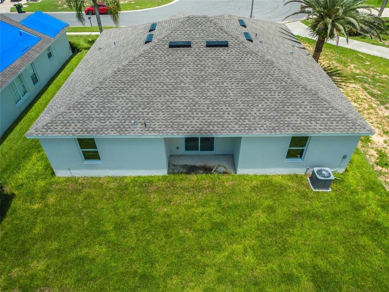 Front exterior of a new home in , Kissimmee, FL, highlighting curb appeal (Image 27).