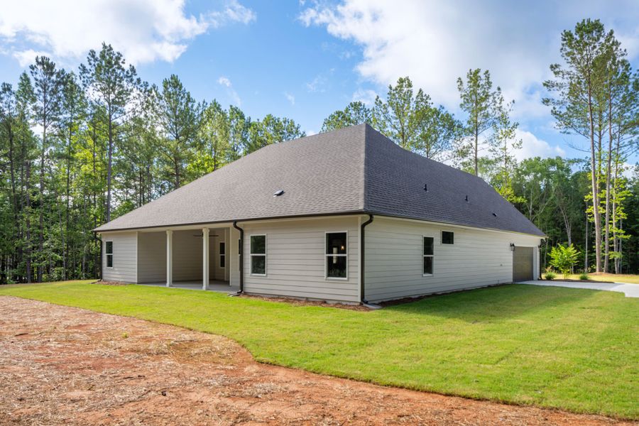 Front exterior of a new home in Flint Farms, Concord, GA, highlighting curb appeal (Image 27).