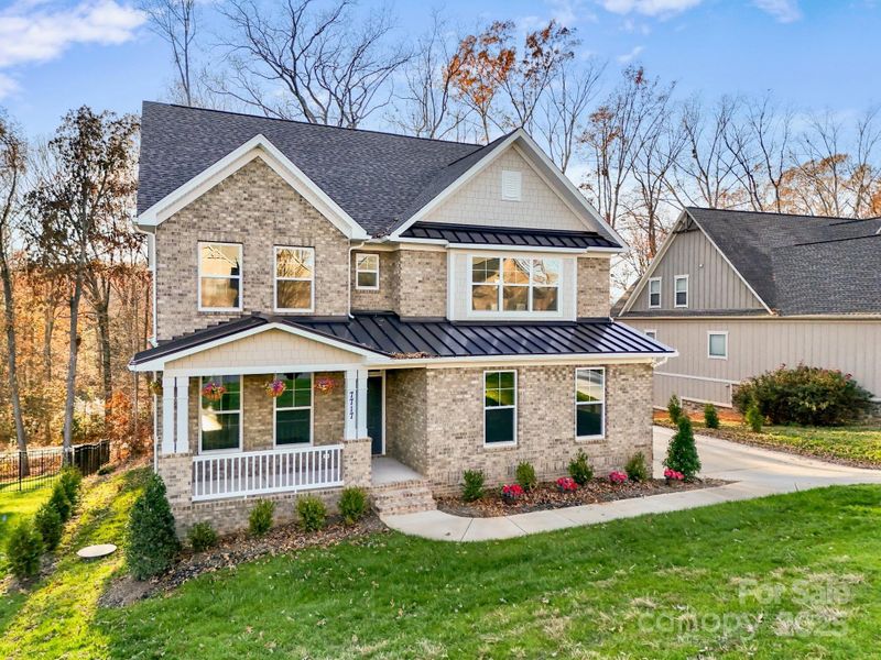 Front exterior of a new home in , Denver, NC, highlighting curb appeal (Image 1).
