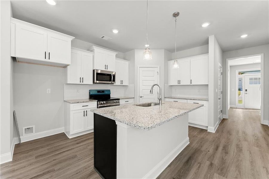 Furnished interior view inside a new home in Magnolia Villas, Cornelia (Image 6).