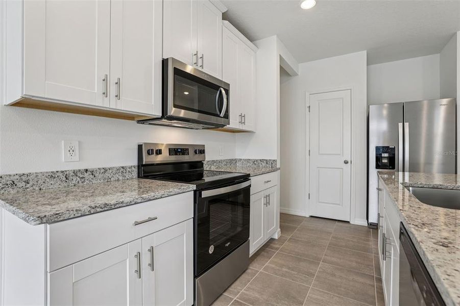 Furnished interior view inside a new home in Hamilton Bluff - Classic Series, Lake Hamilton (Image 9).