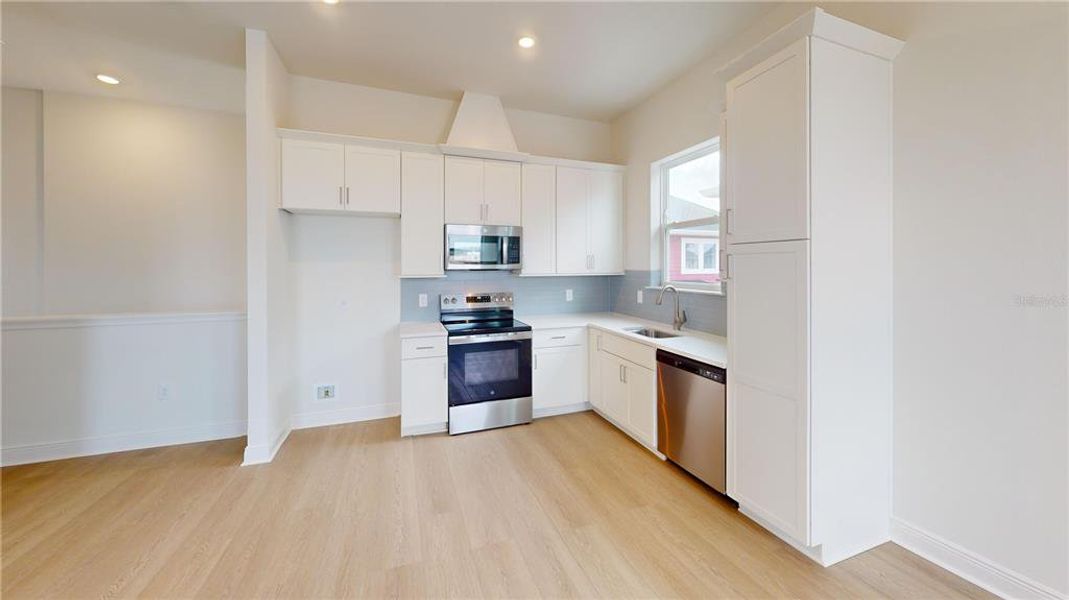 Furnished interior view inside a new home in Laureate Park, Orlando (Image 6). Furnished interior view inside a new home in Laureate Park, Orlando (Image 6).