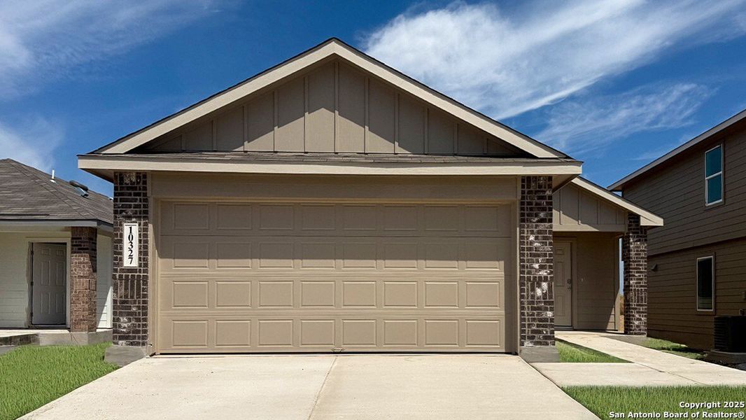 Front exterior of a new home in Sereno Springs, Converse, TX, highlighting curb appeal (Image 1). Front exterior of a new home in Sereno Springs, Converse, TX, highlighting curb appeal (Image 1).