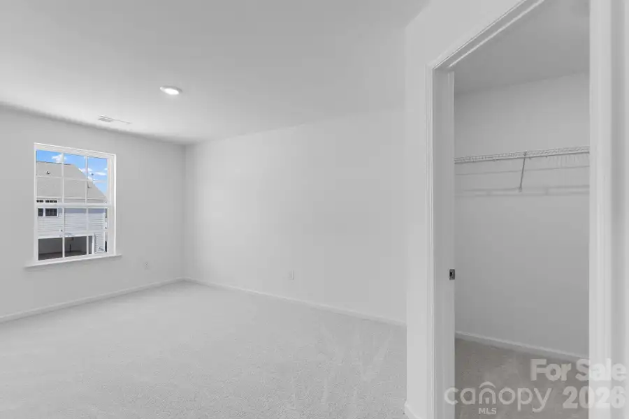 Spacious, unfurnished interior of a new home in Cannon Village, York (Image 10).