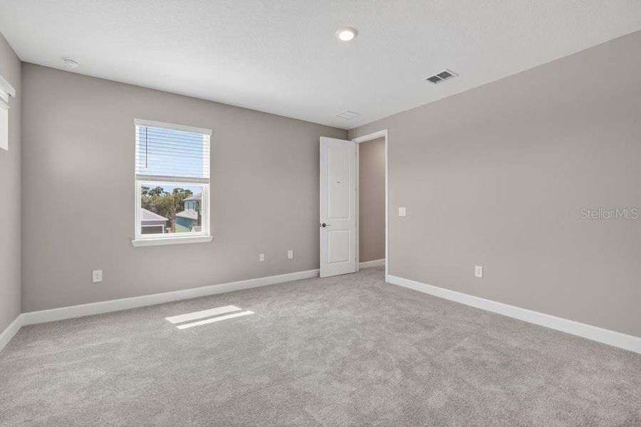 Spacious, unfurnished interior of a new home in Firethorn, Parrish (Image 34).
