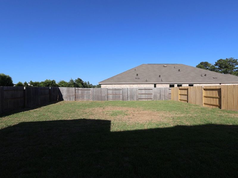 Exterior details and patio area of a home in Moran Ranch, Willis (Image 13).