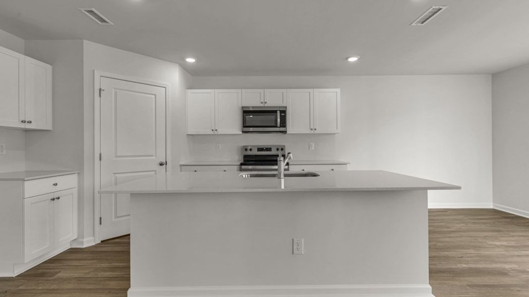 Furnished interior view inside a new home in Willow Mill, Thomasville (Image 3). Furnished interior view inside a new home in Willow Mill, Thomasville (Image 3).