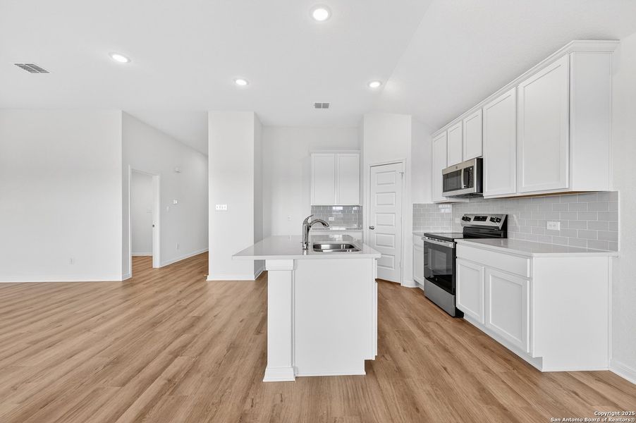 Furnished interior view inside a new home in Paloma Park, Converse (Image 9).