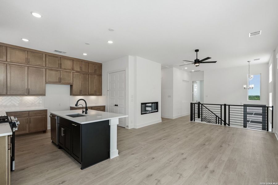 Furnished interior view inside a new home in Centero at Stone Oak, San Antonio (Image 15).