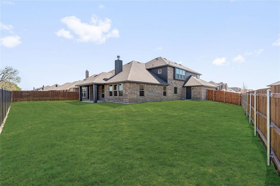 Exterior details and patio area of a home in Sunrise at Garden Valley, Waxahachie (Image 4). Exterior details and patio area of a home in Sunrise at Garden Valley, Waxahachie (Image 4).
