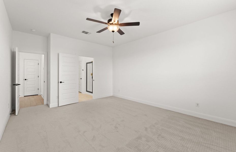 Representative unfurnished interior of a home built from the Orchard by Pulte Homes in Saddleback at Santa Rita Ranch, Liberty Hill (Image 11).