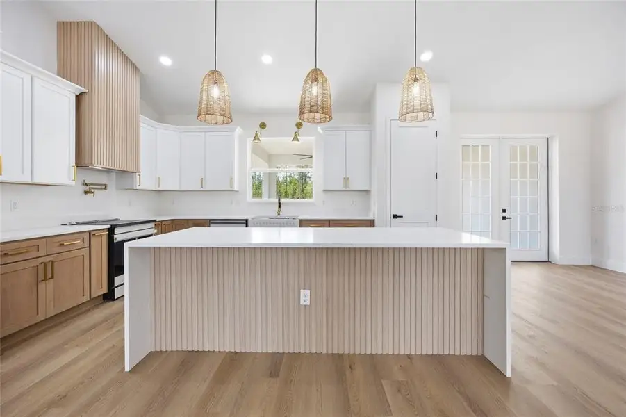 Furnished interior view inside a new home in , Dunnellon (Image 7).