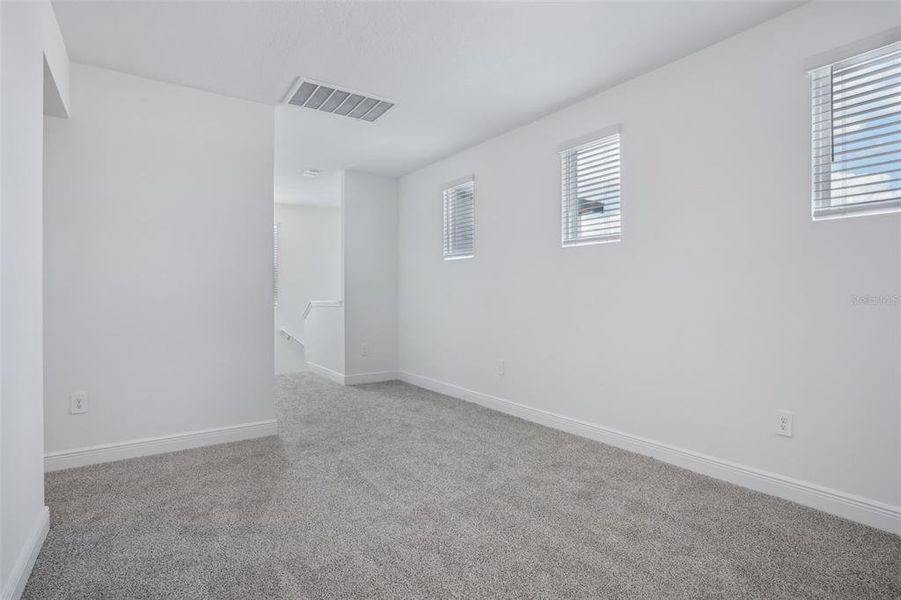 Spacious, unfurnished interior of a new home in Cyrene at Minneola - Villas, Montverde (Image 15). Spacious, unfurnished interior of a new home in Cyrene at Minneola - Villas, Montverde (Image 15).