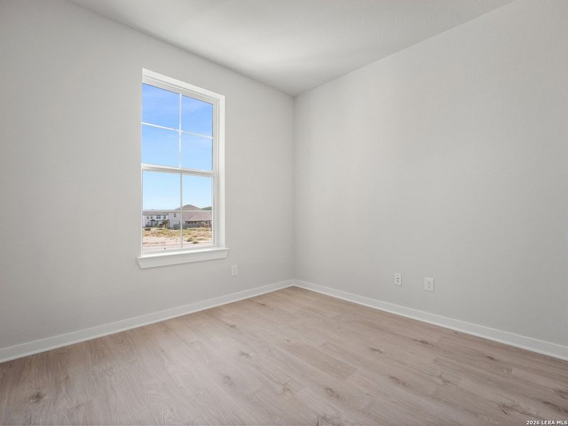 Spacious, unfurnished interior of a new home in Hunter's Ranch, San Antonio (Image 30).