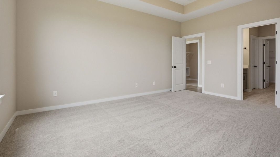Bedroom with access to primary bathroom, closet, and gathering room Bedroom with access to primary bathroom, closet, and gathering room