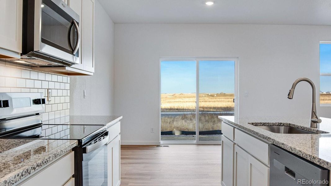 Furnished interior view inside a new home in Spring Valley Ranch, Elizabeth (Image 10).