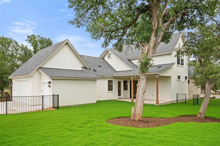 A pristine exterior with verdant landscaping and ample yard space beckons. A pristine exterior with verdant landscaping and ample yard space beckons.