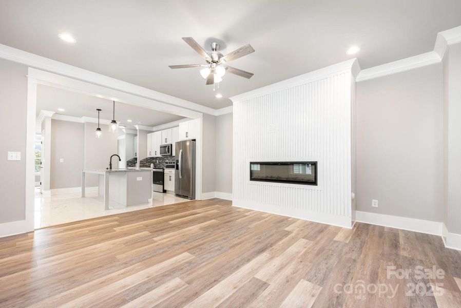 Open concept, family room with electric fireplace Open concept, family room with electric fireplace