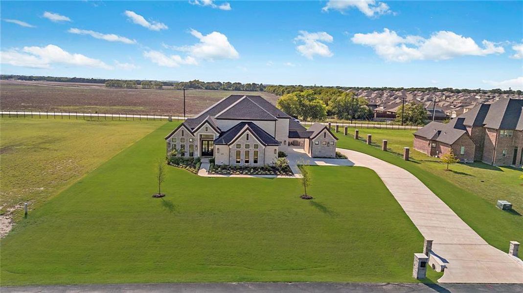 Front exterior of a new home in , McKinney, TX, highlighting curb appeal (Image 1). Front exterior of a new home in , McKinney, TX, highlighting curb appeal (Image 1).