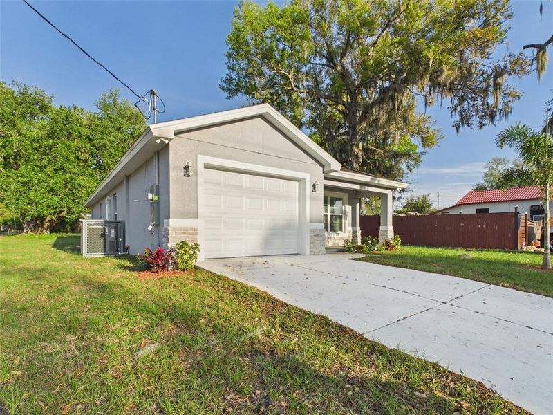 Front exterior of a new home in , Lakeland, FL, highlighting curb appeal (Image 16).