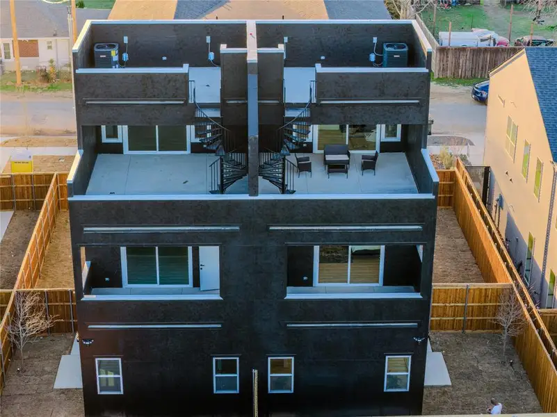 Dramatic aerial perspective showcasing multiple patios with expansive, multi-level views of the Downtown Dallas skyline. Dramatic aerial perspective showcasing multiple patios with expansive, multi-level views of the Downtown Dallas skyline.