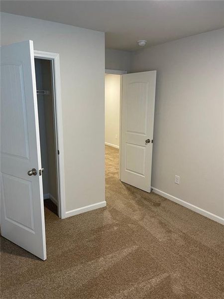 Spacious, unfurnished interior of a new home in The Enclave Townhomes, Hampton (Image 13).