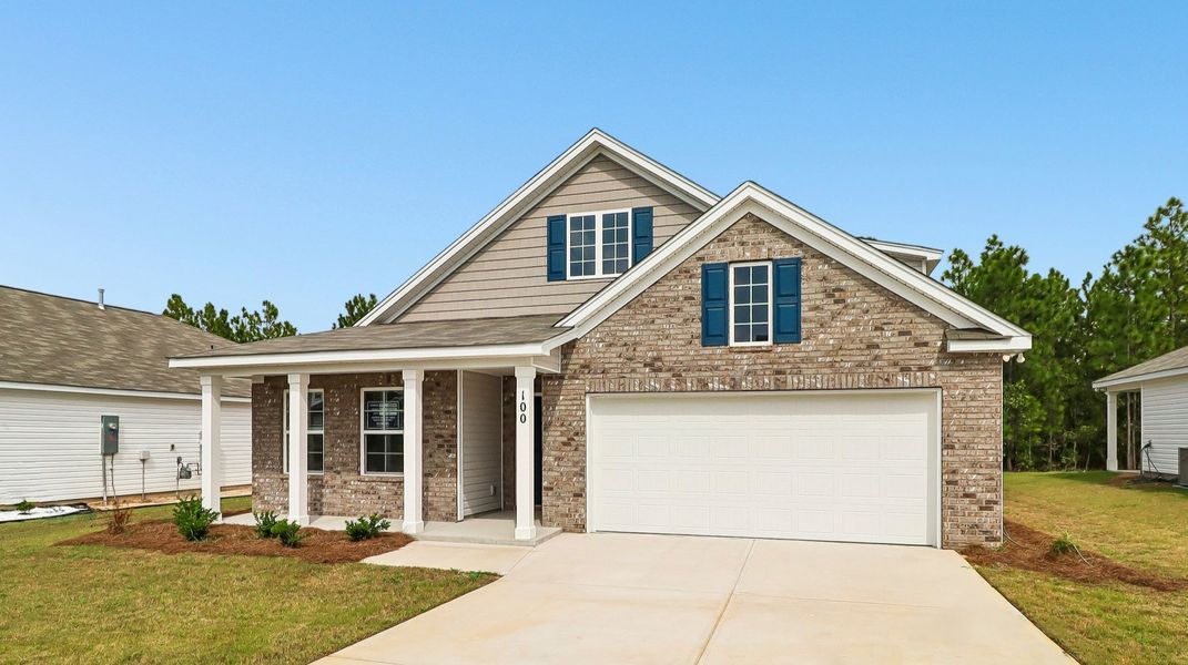 Front exterior of a new home in Gates Village, Lugoff, SC, highlighting curb appeal (Image 17).