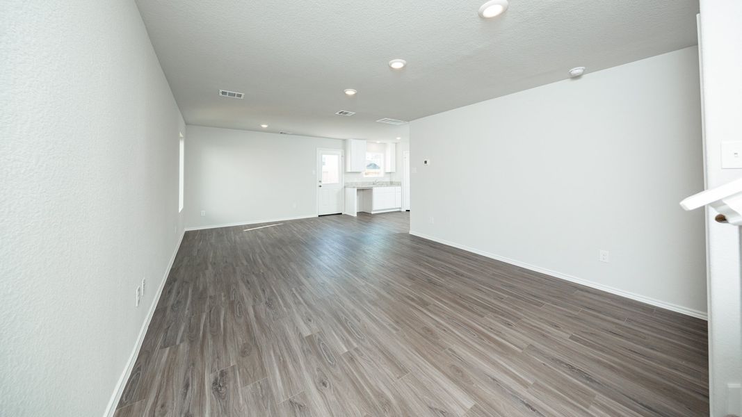 Family Room to Dining Area and Kitchen Family Room to Dining Area and Kitchen