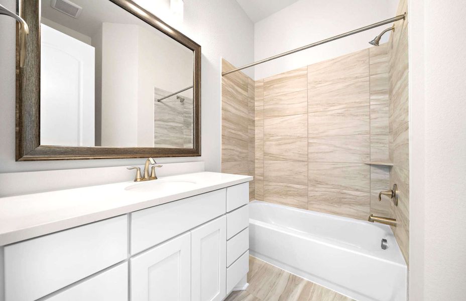 Furnished interior view inside a new home in Bridgeland 60′, Cypress (Image 15).