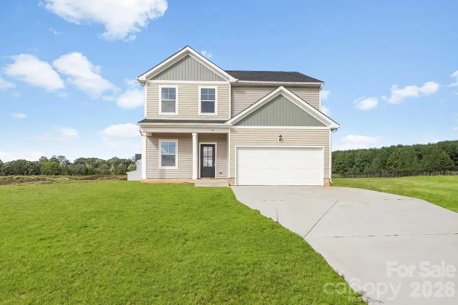 Front exterior of a new home in , Statesville, NC, highlighting curb appeal (Image 1). Front exterior of a new home in , Statesville, NC, highlighting curb appeal (Image 1).