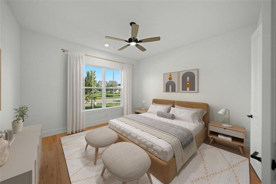 Bedroom featuring light wood-type flooring, ceiling fan, and recessed lighting Bedroom featuring light wood-type flooring, ceiling fan, and recessed lighting
