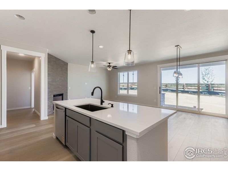 Furnished interior view inside a new home in Barefoot Lakes, Firestone (Image 9).