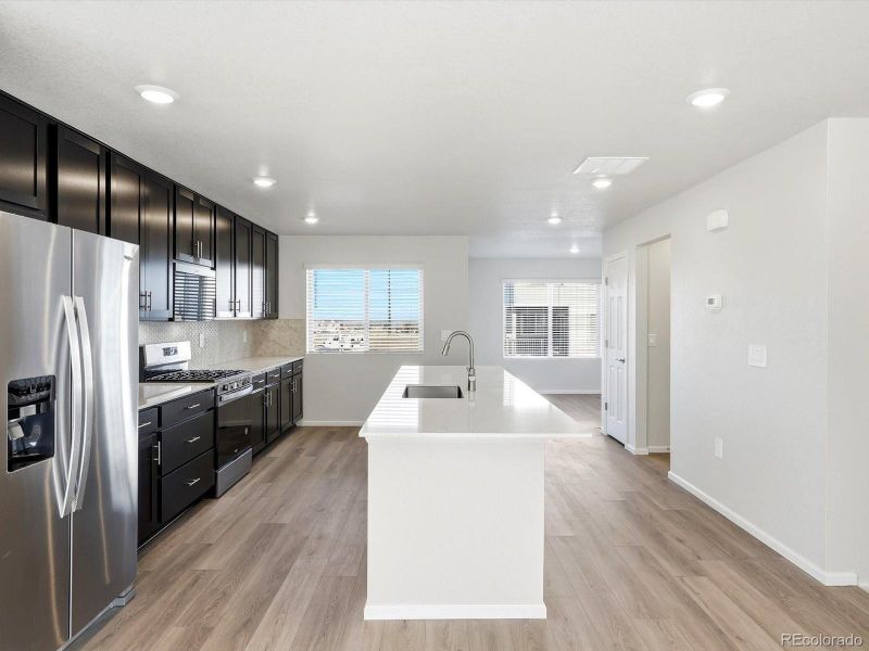 Furnished interior view inside a new home in Three Hills, Morrison (Image 12).