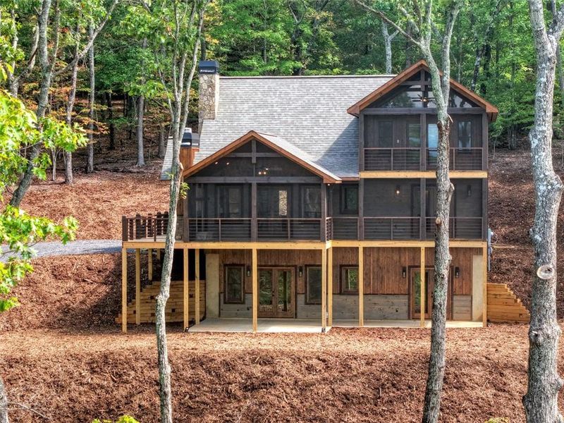 Front exterior of a new home in , Morganton, GA, highlighting curb appeal (Image 2).