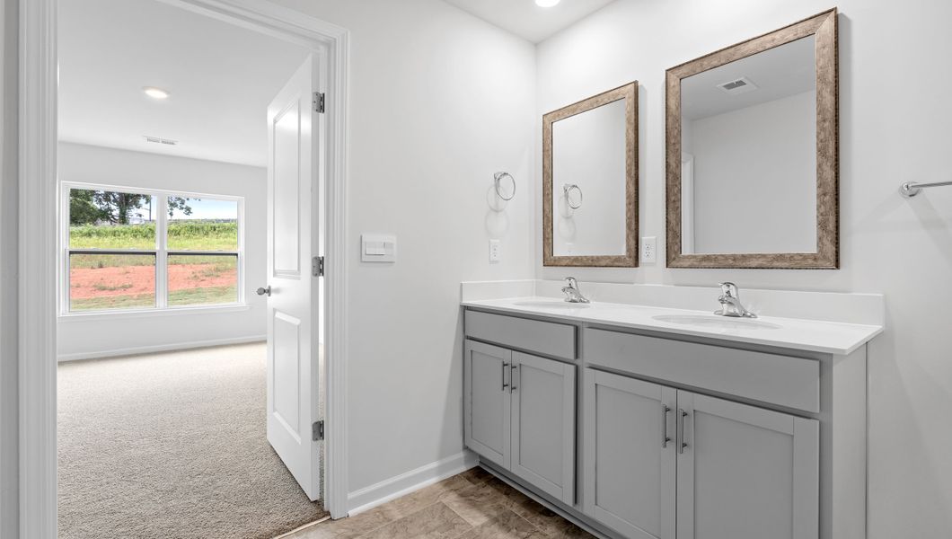 Furnished interior view inside a new home in Lakestone, Woodruff (Image 10).