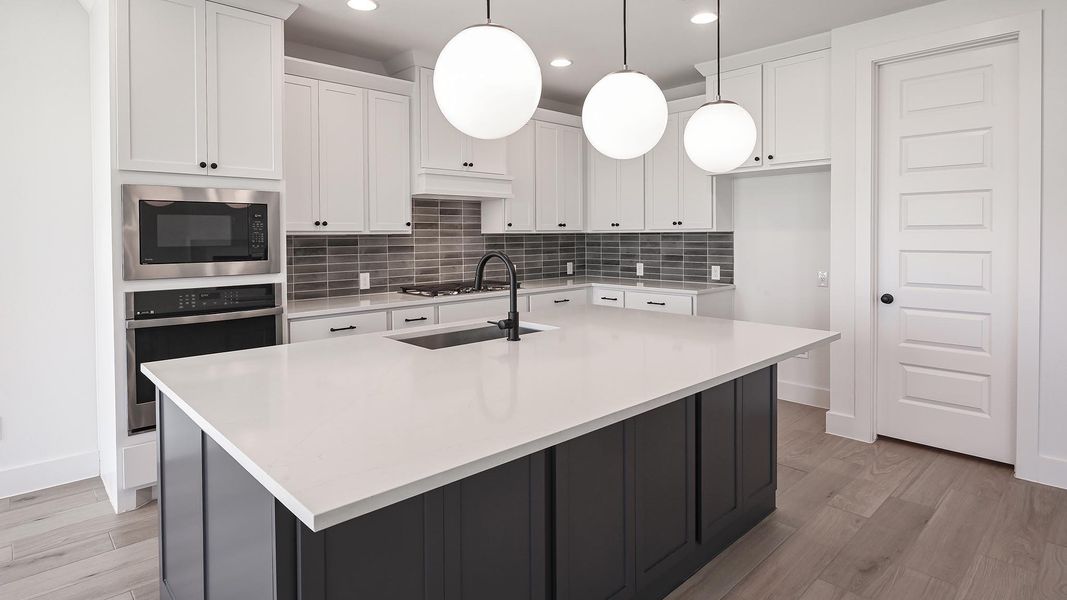 Furnished interior view inside a new home in Crosswinds, Kyle (Image 10).