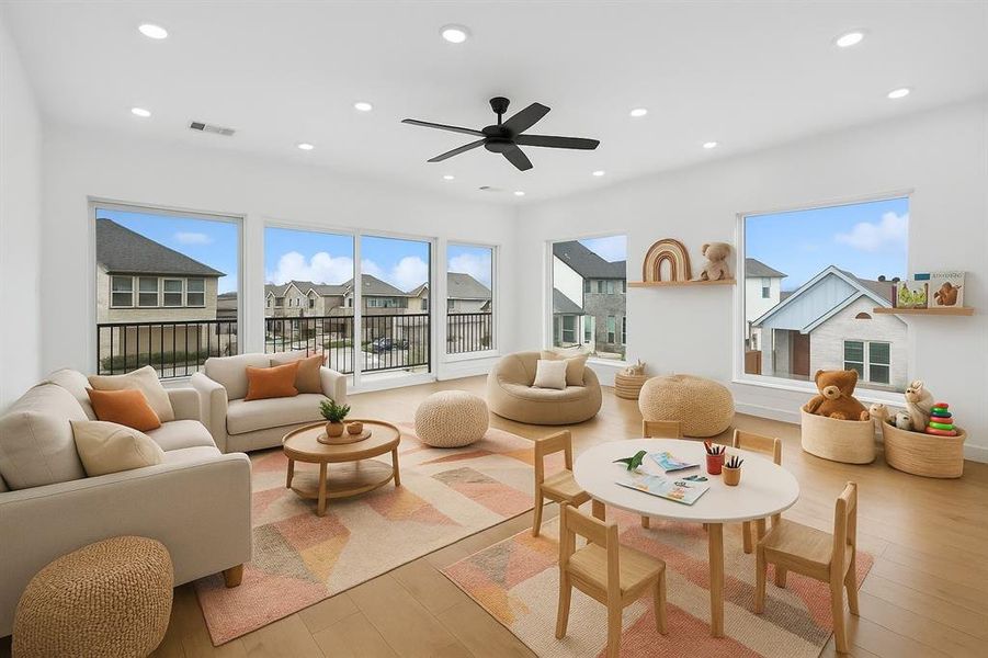 Living room with hardwood / wood-style flooring, ceiling fan, recessed lighting, and a residential view, virtually staged