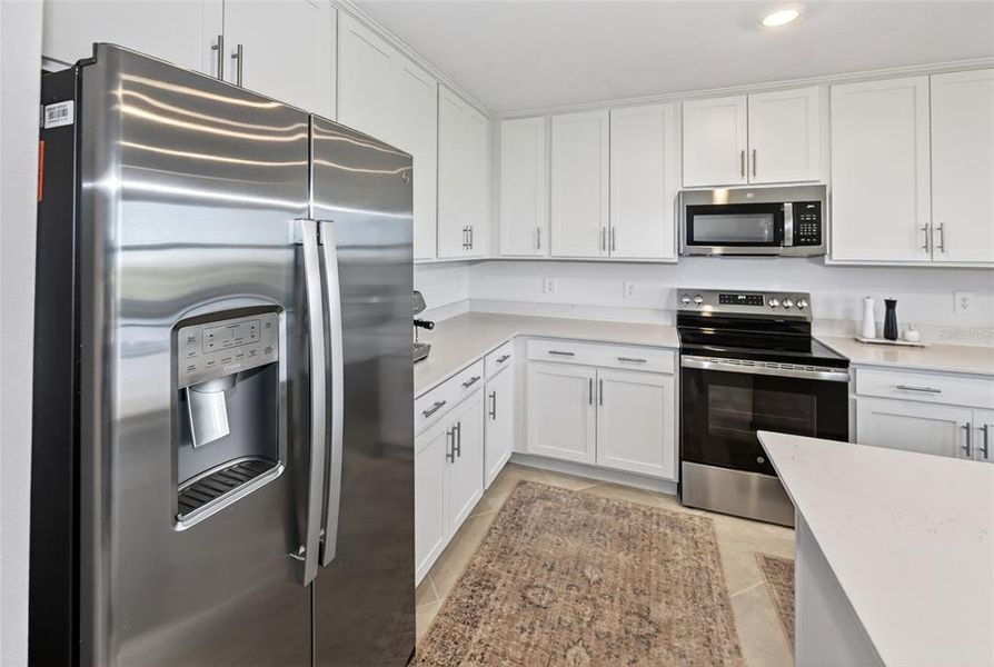 Furnished interior view inside a new home in Wellen Park Golf & Country Club, Venice (Image 16).